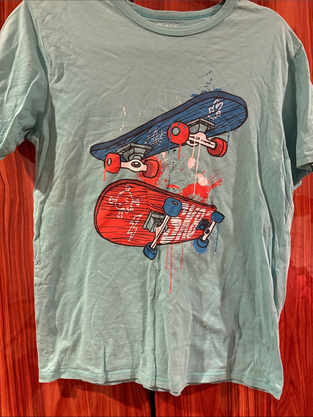 Place Light Teal Short-Sleeve Tee with Red and Blue Skateboard Graphic
